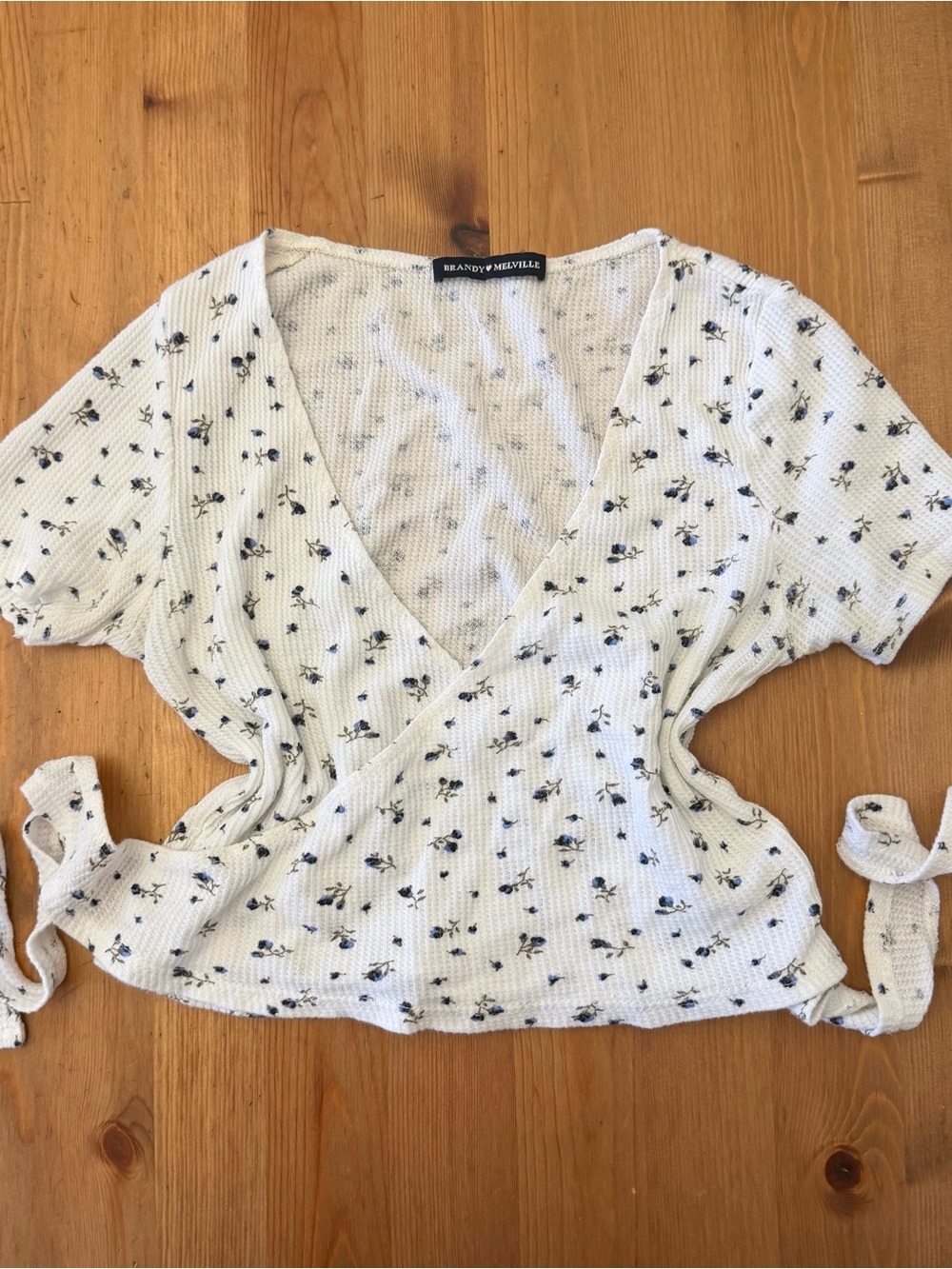 Brandy Melville Cream Wrap Top with Blue Floral Print
